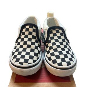 Vans Black and White Classic Slip-On Sneakers